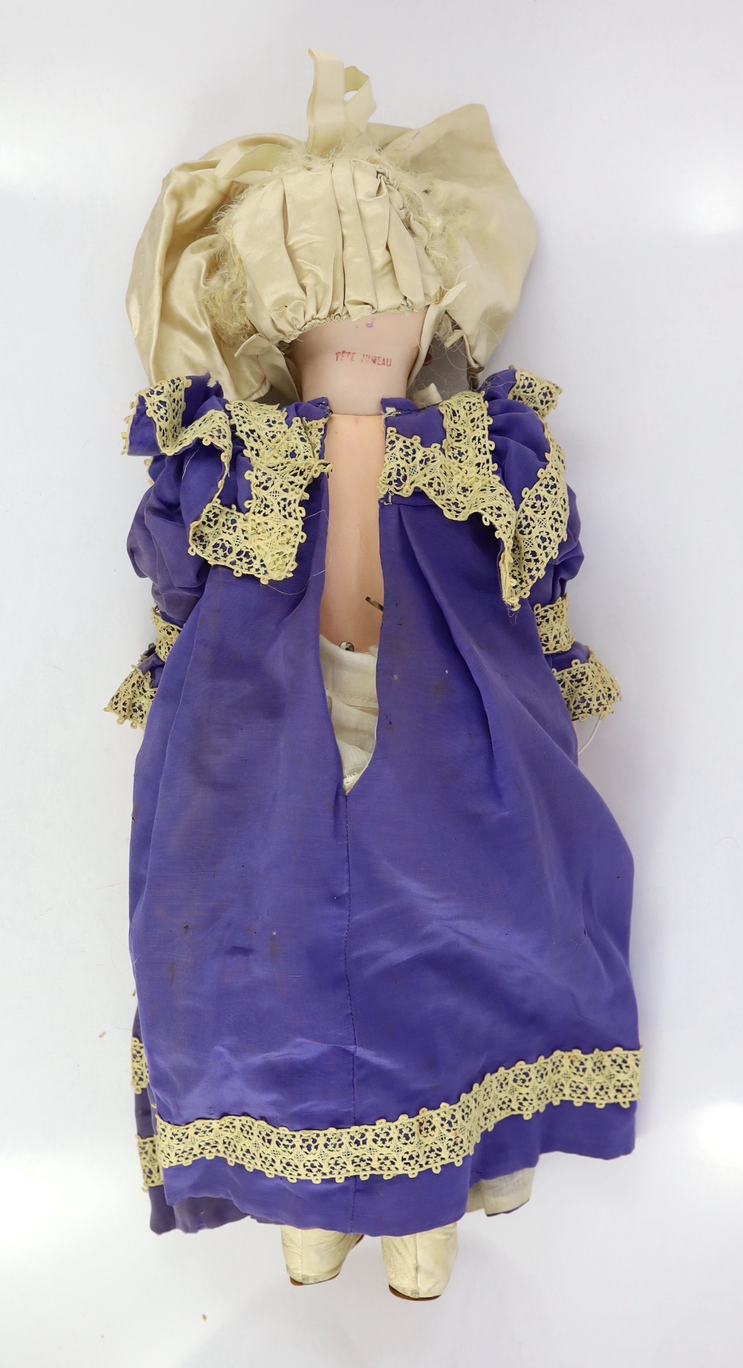 A Jumeau moulded bisque phonograph doll, French, circa 1889, 24in.